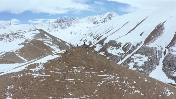 Hikers at the Top of the Mountain