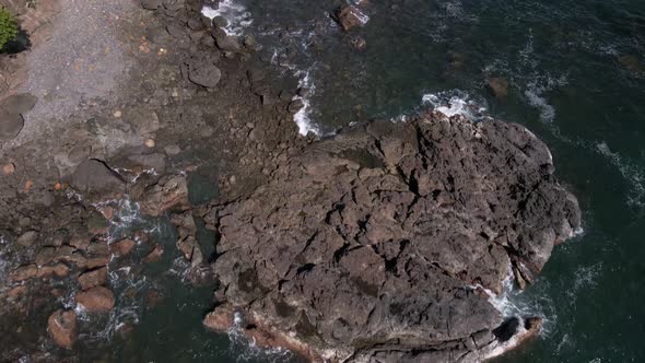 aerial footage of the rocky coastline of the pacific ocean and the western shores of costa rica in c