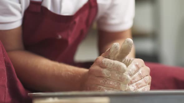 Tableware Production the Man Potter Makes a Pitcher Out of Clay Closeup View Handicraft the Process