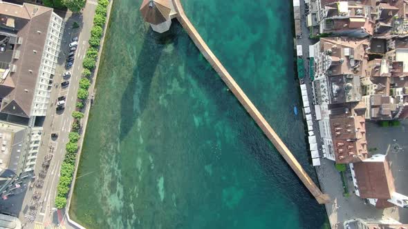 Top-down aerial shot of The Kapellbrucke (Chapel Bridge) in Lucerne, Switzerland