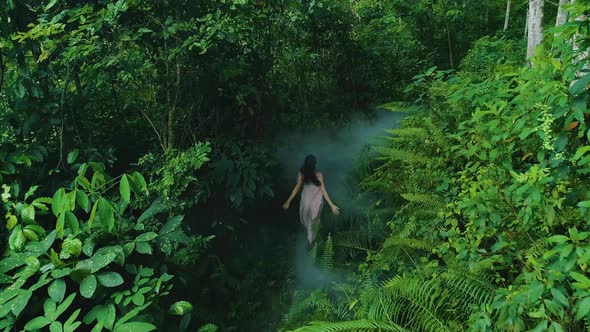 Girl Running On A Forest Path 2