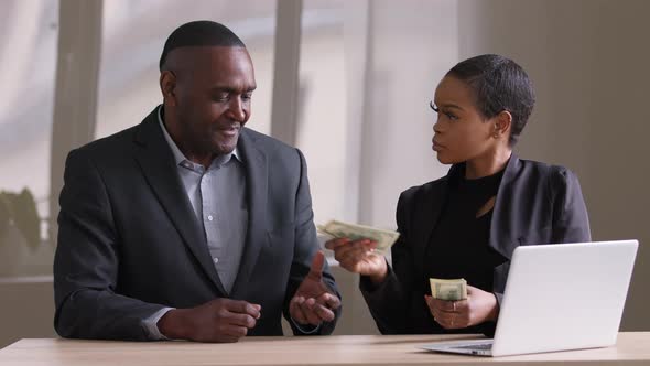 Successful Professional Afro Businesswoman Sitting at Table with African Ethnic Black Colleague Man