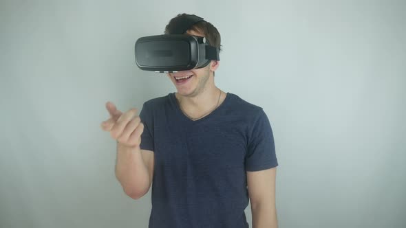 Man Uses The Virtual Reality Helmet