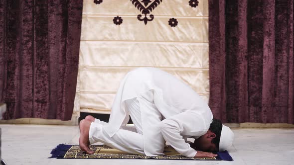 Muslim man practicing Ramadan prayer