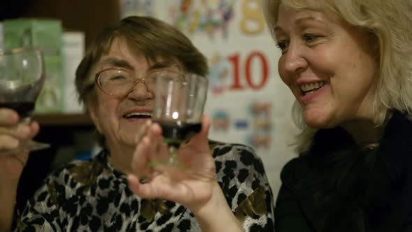 Two women enjoying a drink together