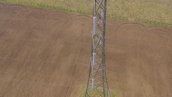 High Voltage Electrical Transmission Pylon Close Up Aerial View