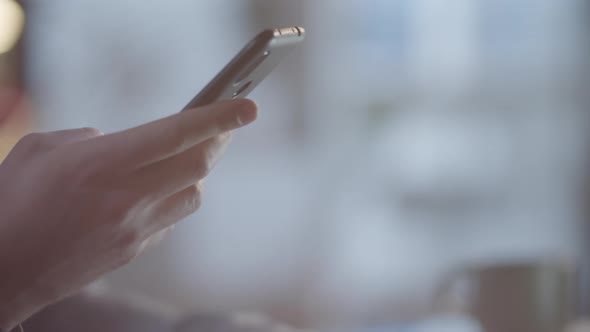 Close up of Man Using Phone