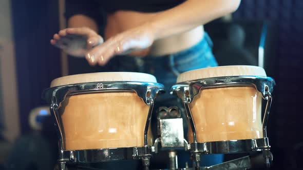 Close up of hands playing Djembe Drum