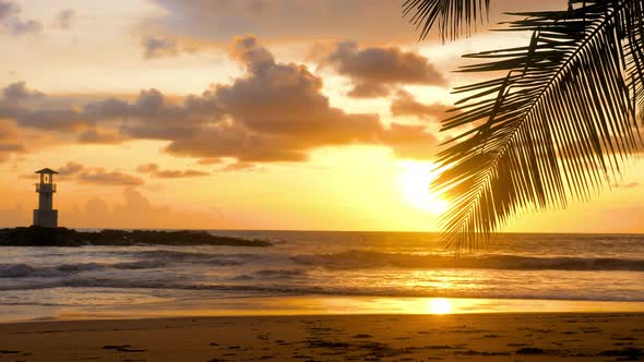 Golden Sunset Over Ocean Waves Washing Sand of Tropical Beach