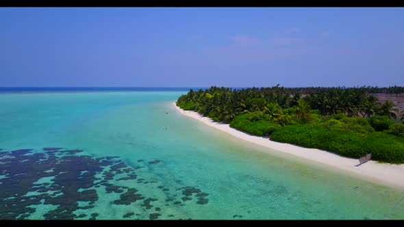 Aerial top view seascape of paradise shore beach time by transparent ocean with white sandy backgrou
