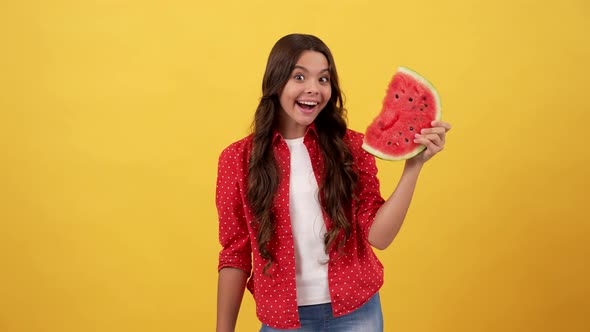 Funny Child Point Finger on Water Melon Slice on Yellow Background Fruit