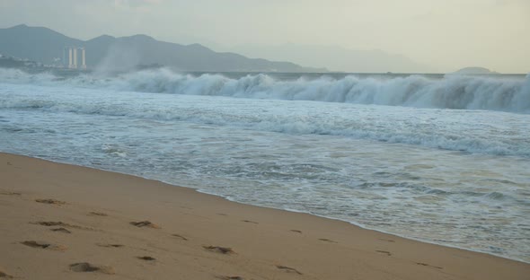 The Trail of the Sun on the Waves in the Sand