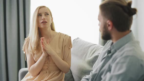 Excited Woman Talking to Man