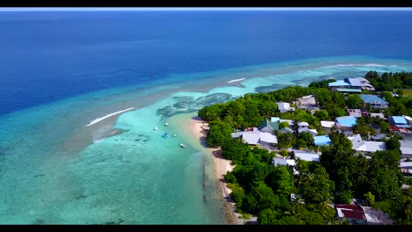 Aerial drone shot travel of beautiful coastline beach journey by blue sea and white sandy background