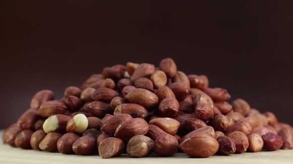 Raw Peanuts in Their Husks Rotate in a Circle Closeup