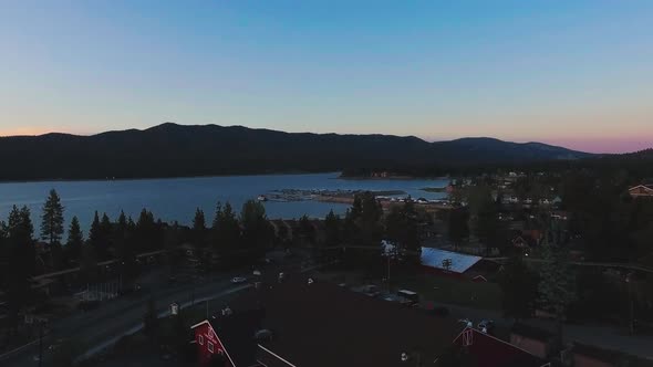 Drone moves over the roofs near Big Bear observatory, Big Bear Lake, California