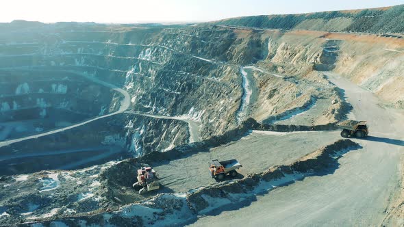 Industrial Machines are Riding Along the Copper Mine Deposit