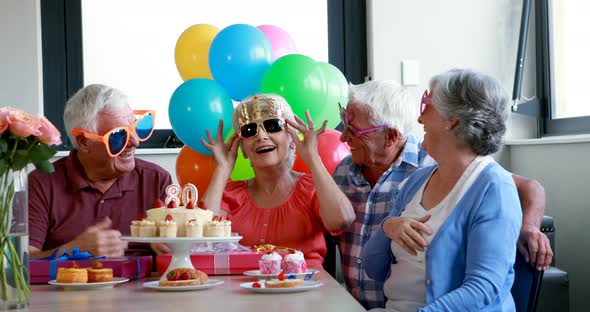 Senior citizens celebrating birthday party