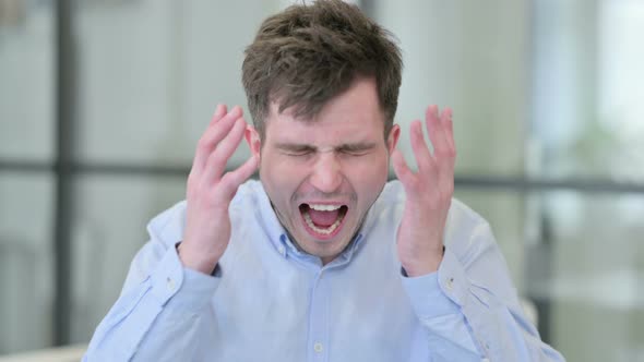 Angry Young Man Shouting Screaming