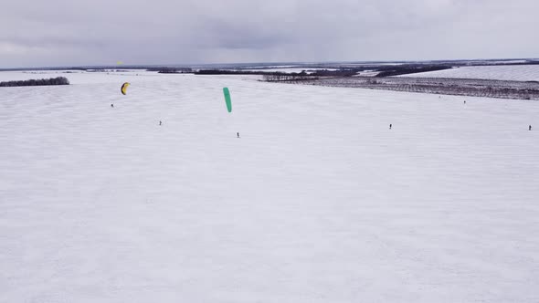 SnowKiting Kitesurfing Sport on the Ice Lake Winter