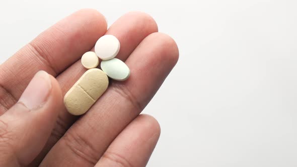 Hand Holding Pills with Copy Space 