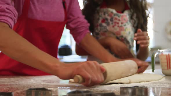 Family making Christmas cookies at home