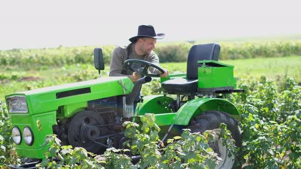 The Agronomist Bought a New Mini Tractor He is Happy and Looks at It