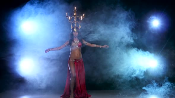 Attractive Belly Dancer Starts Dancing with Candles on Her Head, Black, Smoke