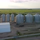 Aerial View of Industrial Ventilated Silos for Long Term Storage of Grain and Oilseed - VideoHive Item for Sale