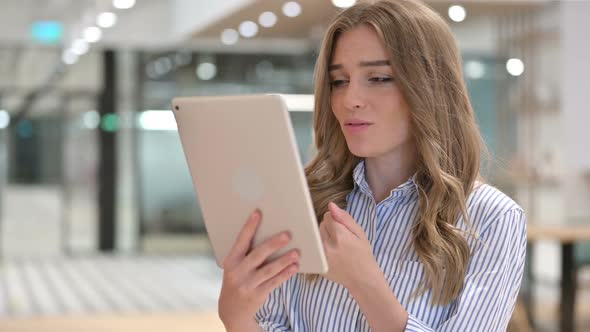 Portrait of Businesswoman Doing Video Call on Digital Tablet