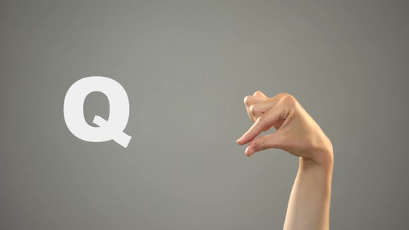 Letter Q in Sign Language, Hand on Background, Communication for Deaf, Lesson