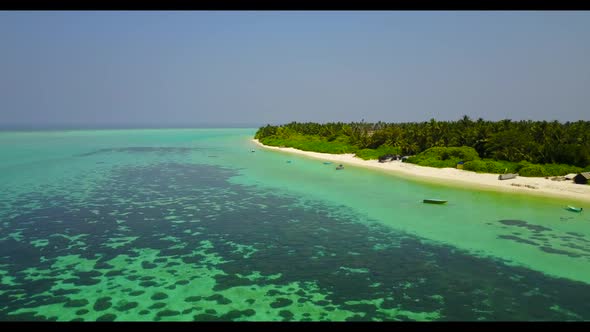 Aerial top down scenery of luxury coast beach holiday by blue ocean with white sand background of a 