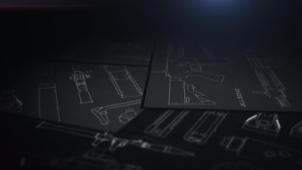 documents of the development of military firearms, the drawings are on the table