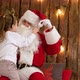 Cute Little Girl Pulling Santa's Beard To Check If It's Real Sitting on His Lap - VideoHive Item for Sale