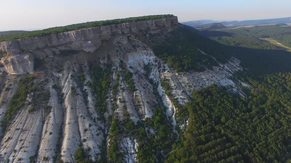 Aerial View Vertically Down on the Valley with Green Trees in White Canyon