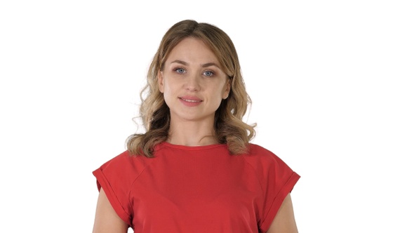 Blonde woman listening to someone on white background