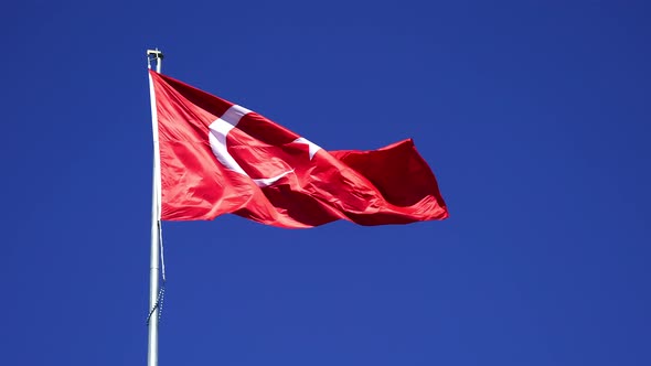 Turkish flag is waving. Waving flag outdoors.