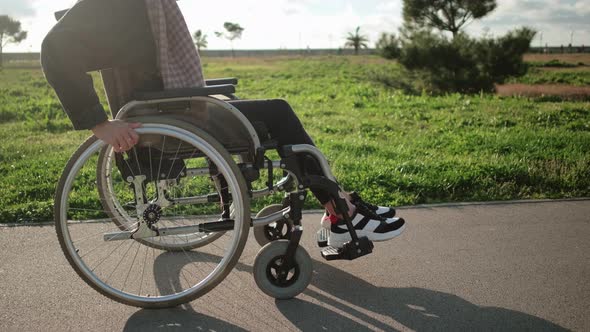 Handicapped Woman in Wheelchair Outdoors