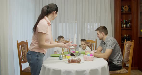 Mother Puts the Powder on the Cake