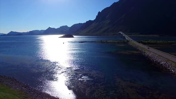 Flying by Gimsoystraumen bridge on Lofoten islands in Norway