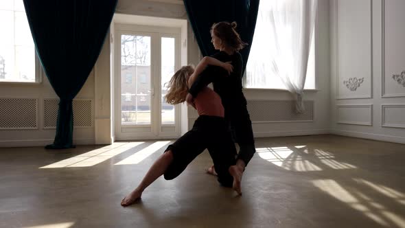 Loving Couple is Dancing in Dance Hall Performing Modern Choreography Love Story of Two Lovers