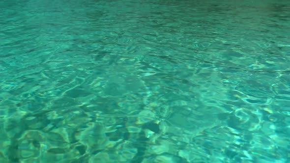 Water in the Pool Sunlight Is Reflected Small Waves