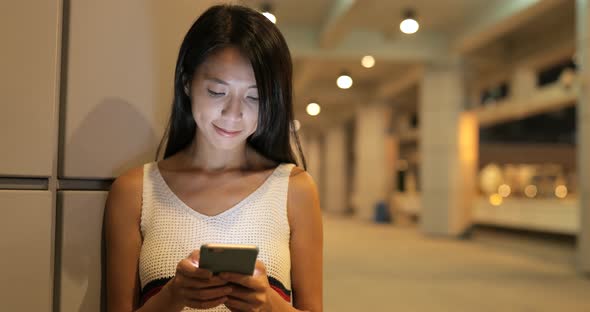 Woman Use of Mobile Phone at Night