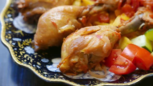 Chicken Thighs with Vegetables on a Plate