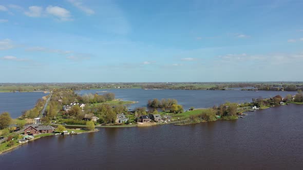 Lateral View Of The Horizon With Houses And The Lake