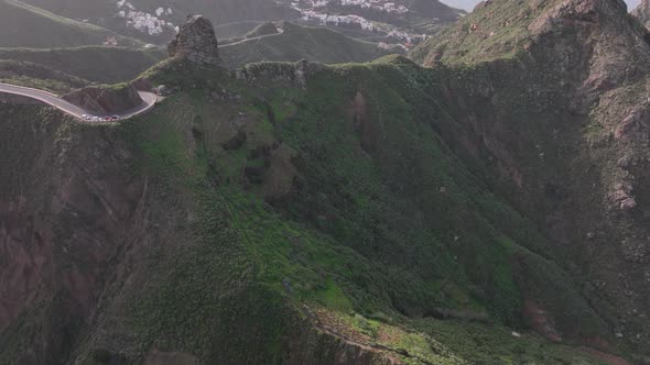 Aerial Drone View of a Wild Touristic Twisty Road in the Green Lush Mountains Along the Atlantic