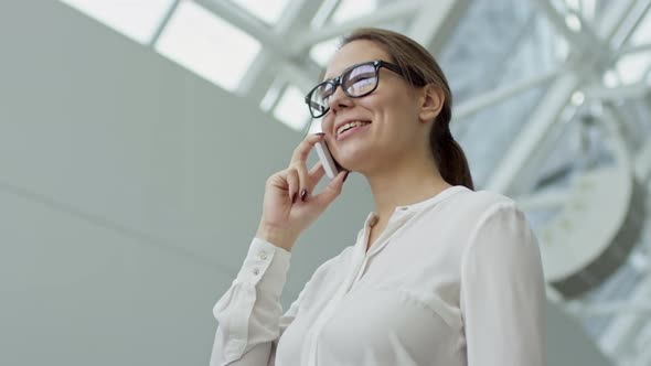 Successful Businesswoman Chatting on Phone