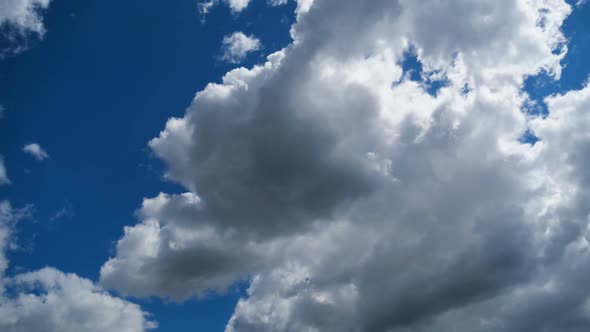 Clouds Move Smoothly in the Blue Sky. Timelapse