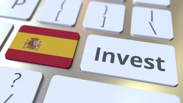INVEST Text and Flag of Spain on the Keyboard