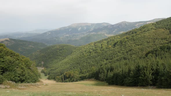 Valley under Midzor peak by the day 4K 2160p 30fps UltraHD footage - Mountain ranges and beautiful n